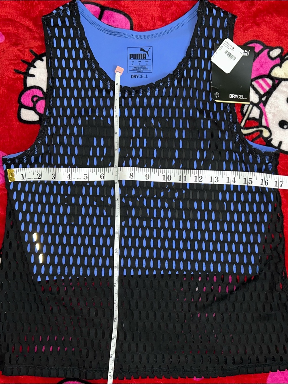Puma Black Mesh Overlay on Bright Blue Athletic Tank